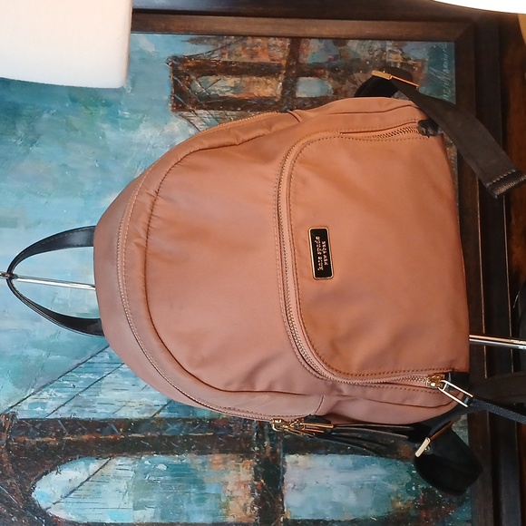 kate spade Handbags - Kate Spade Pink Backpack Sleek Design Adjustable Straps Medium Sized Mini